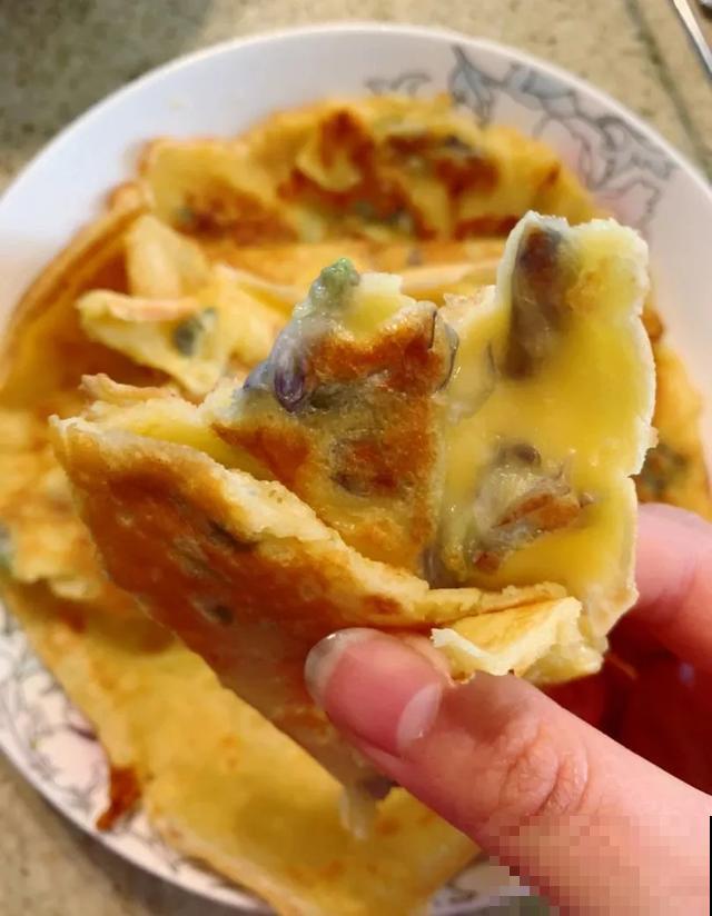 玉兰花真好吃，掐一把炒鸡蛋，竟然满嘴鸡肉味